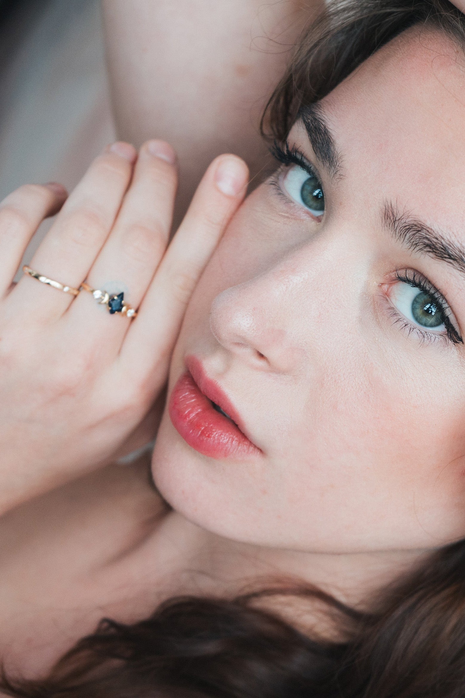 LIRAE celestial ring featuring a kite cut sandstone center stone and gold crescent moons, witchy aesthetic galaxy jewelry for women.