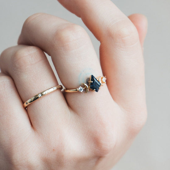LIRAE celestial ring featuring a kite cut sandstone center stone and gold crescent moons, witchy aesthetic galaxy jewelry for women.