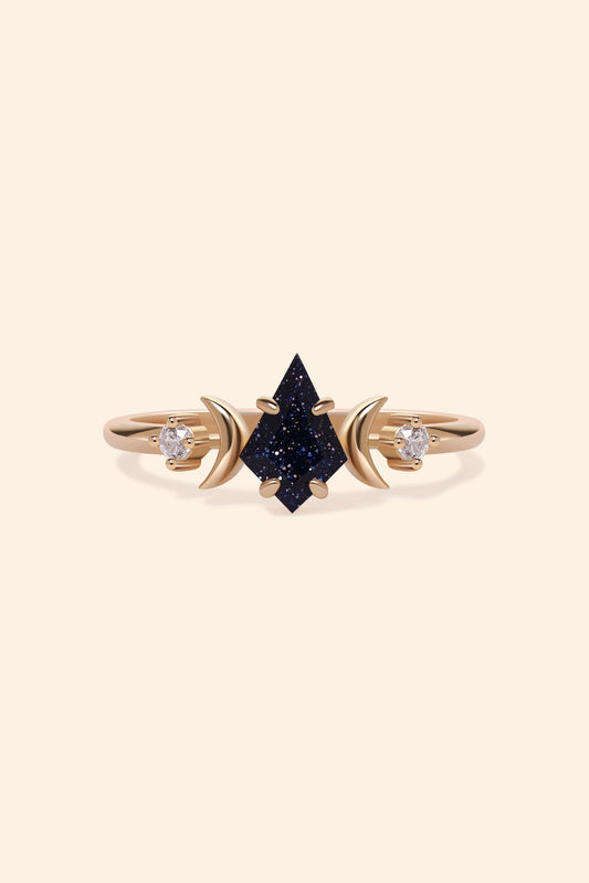 LIRAE celestial ring featuring a kite cut sandstone center stone and gold crescent moons, witchy aesthetic galaxy jewelry for women.
