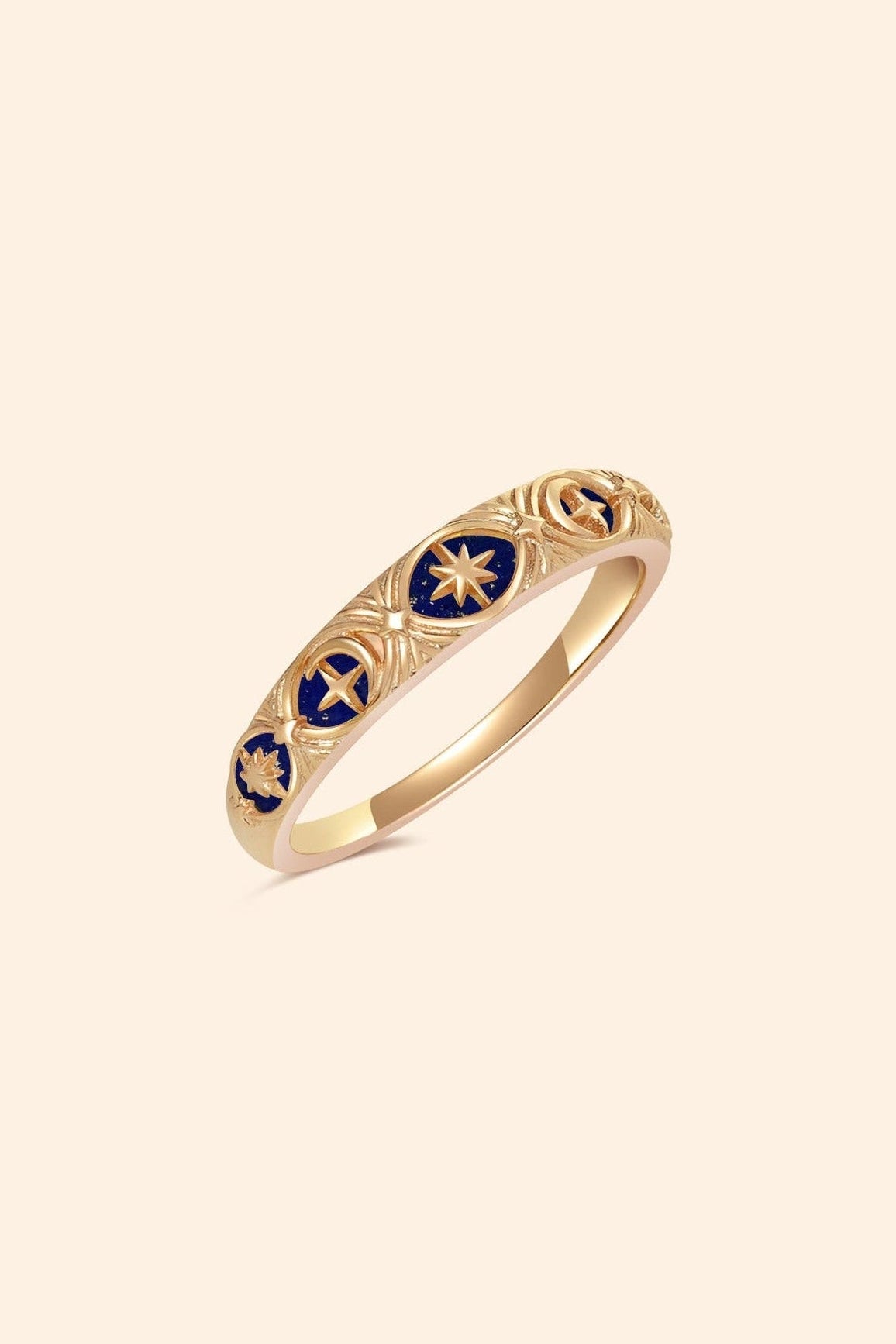 Gold celestial star ring with deep blue lapis lazuli inlay and engraved sun moon details