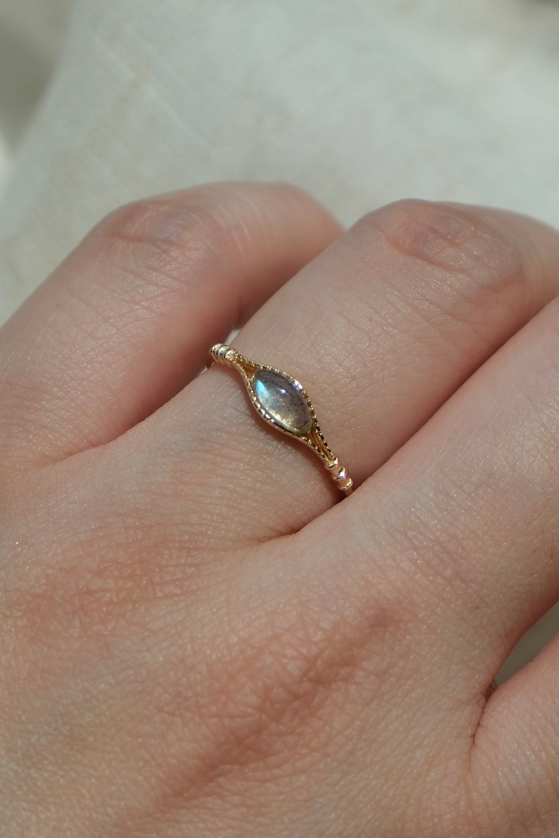 Handcrafted 14k gold-plated marquise labradorite ring with a split-shank band and beaded bezel detail, vintage-inspired bohemian relic jewelry by LIRAE.