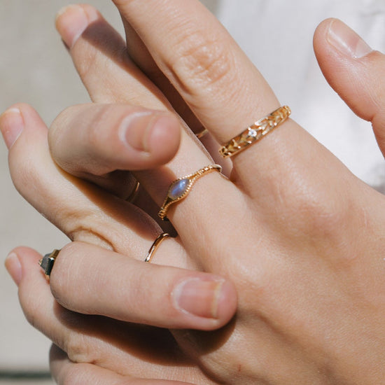 Handcrafted 14k gold-plated marquise labradorite ring with a split-shank band and beaded bezel detail, vintage-inspired bohemian relic jewelry by LIRAE.