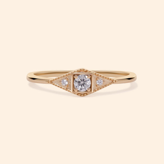 LIRAE Art Deco gold ring featuring a geometric rhombus design with milgrain edges and three moissanites, vintage-inspired stackable jewelry.