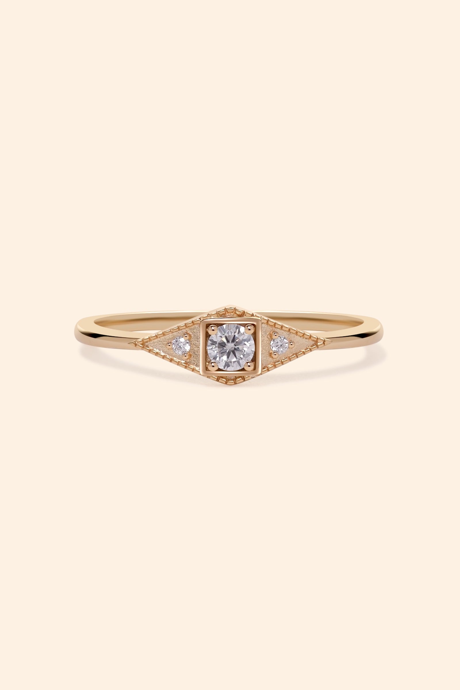 LIRAE Art Deco gold ring featuring a geometric rhombus design with milgrain edges and three moissanites, vintage-inspired stackable jewelry.