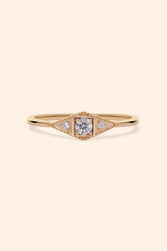 LIRAE Art Deco gold ring featuring a geometric rhombus design with milgrain edges and three moissanites, vintage-inspired stackable jewelry.
