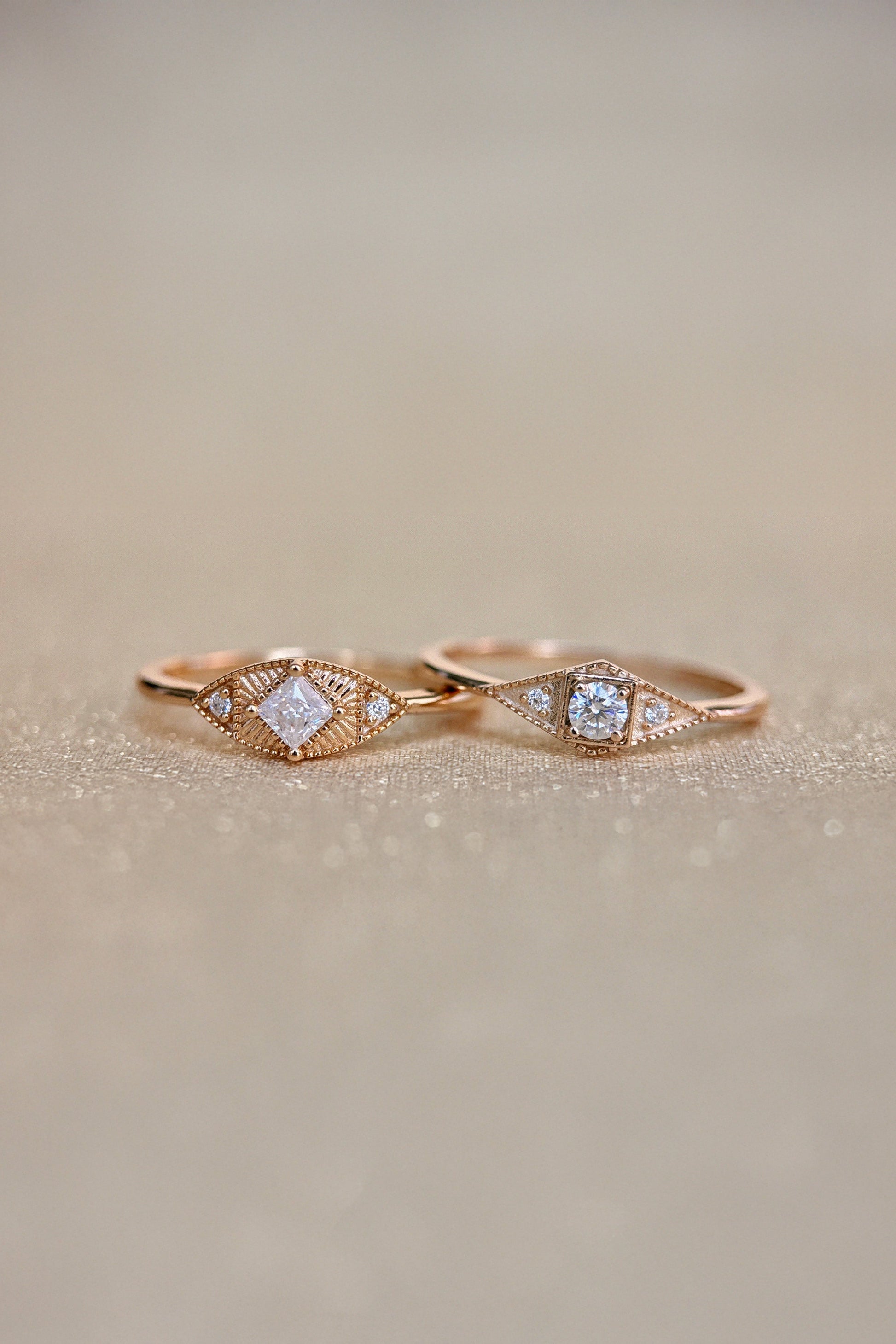 LIRAE Art Deco gold ring featuring a geometric rhombus design with milgrain edges and three moissanites, vintage-inspired stackable jewelry.