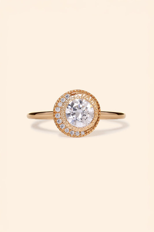 Gold halo ring with round center moissanite stone