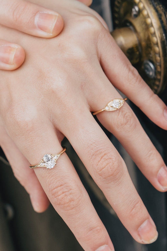 LIRAE vintage-inspired gold ring featuring a square-cut moissanite and sunburst radiant texture, geometric Art Deco jewelry for women.