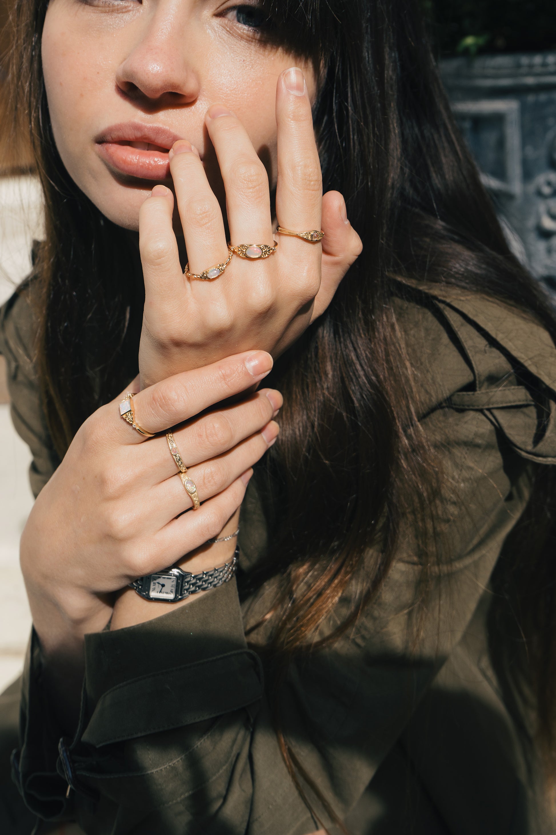 LIRAE vintage-style gold ring with an oval opal center stone and intricate golden swirl filigree, ethereal romantic jewelry for women.