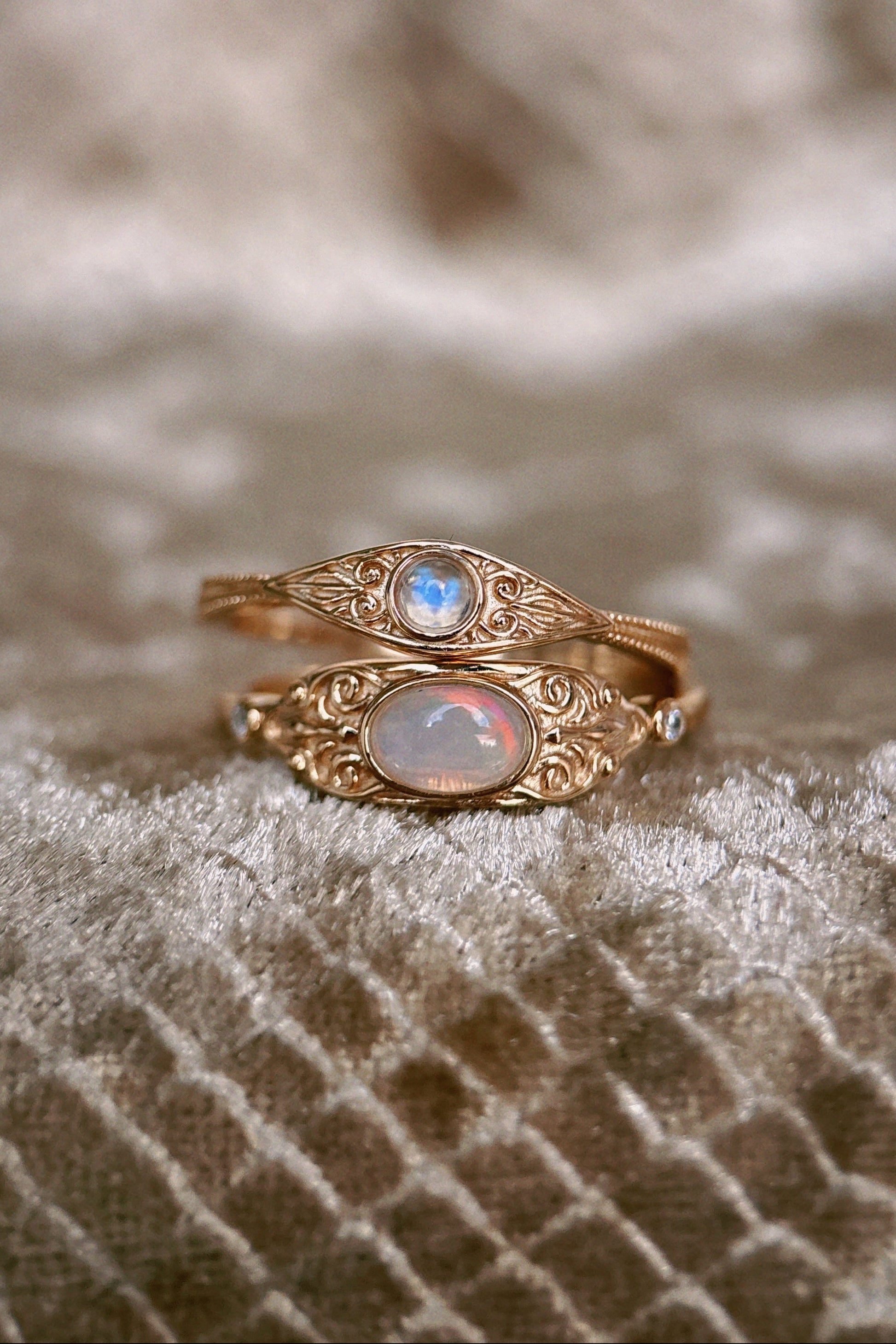 LIRAE vintage-style gold ring with an oval opal center stone and intricate golden swirl filigree, ethereal romantic jewelry for women.