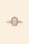 Bold 14k gold oval labradorite statement ring with a central starburst diamond motif and side diamond accents, vintage celestial relic jewelry by LIRAE.