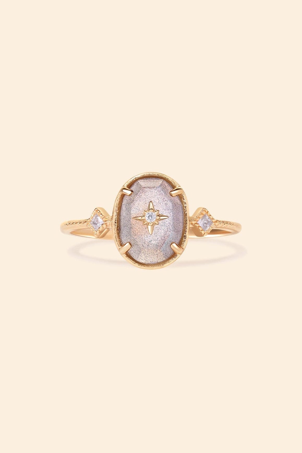 Bold 14k gold oval labradorite statement ring with a central starburst diamond motif and side diamond accents, vintage celestial relic jewelry by LIRAE.