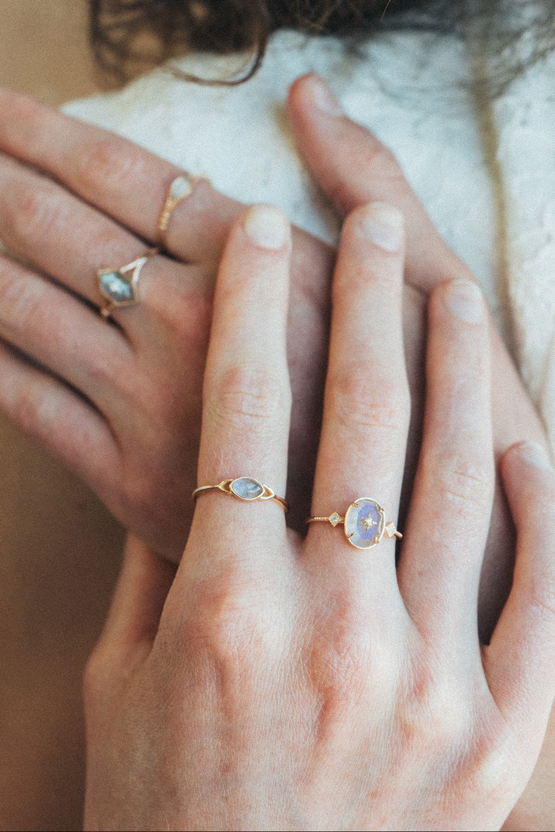Bold 14k gold oval labradorite statement ring with a central starburst diamond motif and side diamond accents, vintage celestial relic jewelry by LIRAE.