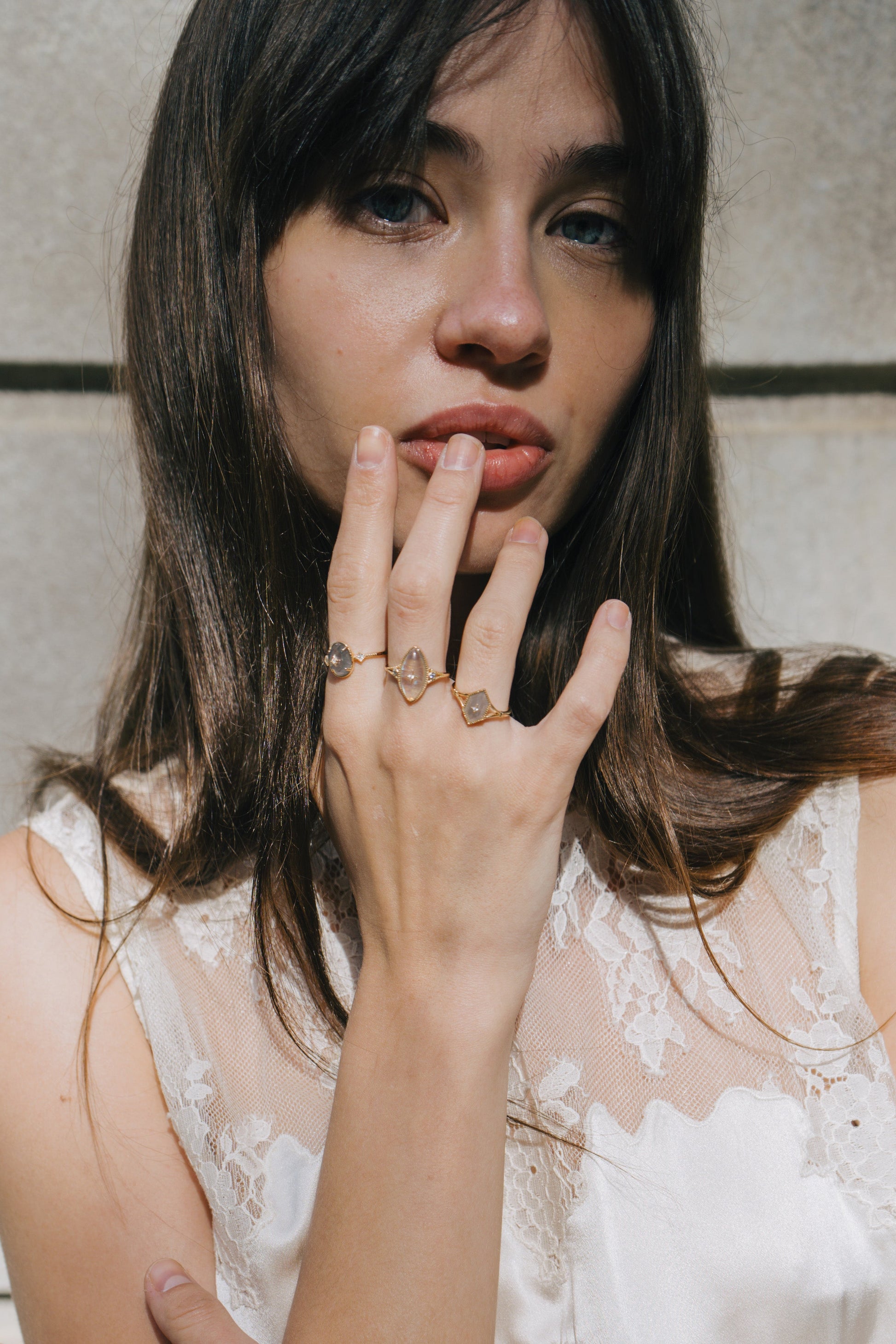 Bold 14k gold oval labradorite statement ring with a central starburst diamond motif and side diamond accents, vintage celestial relic jewelry by LIRAE.