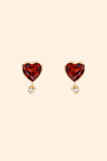 LIRAE vintage style gold heart earrings featuring heart-shaped garnet and a small diamond heart dangle, romantic jewelry for women.