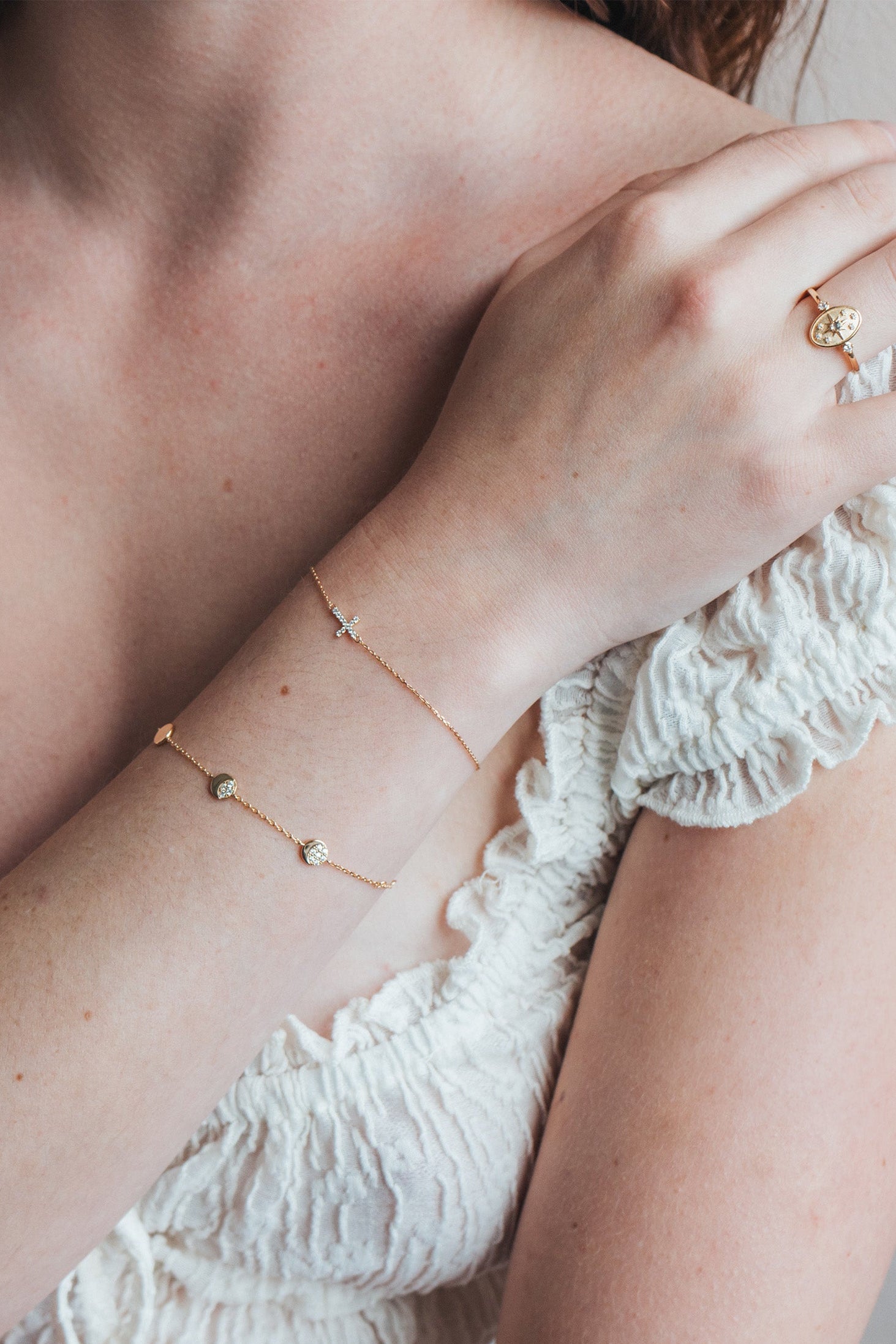 Dainty gold pavé moon phase bracelet with sparkling moon charms