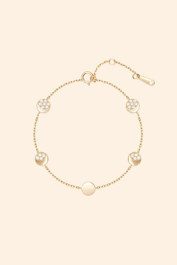 Dainty gold pavé moon phase bracelet with sparkling moon charms