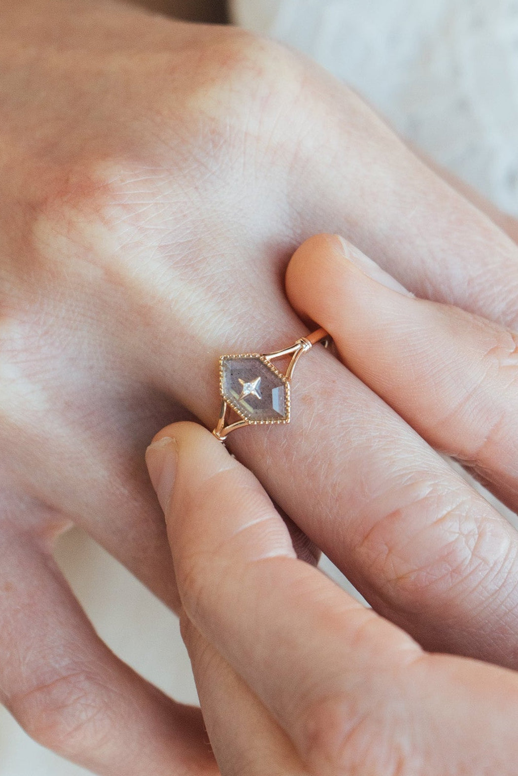 Handmade rhombus labradorite ring with a gold diamond star motif, vintage signet ring by LIRAE.