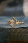 Handmade 14k gold rhombus labradorite ring with a gold diamond star motif, vintage signet ring by LIRAE.