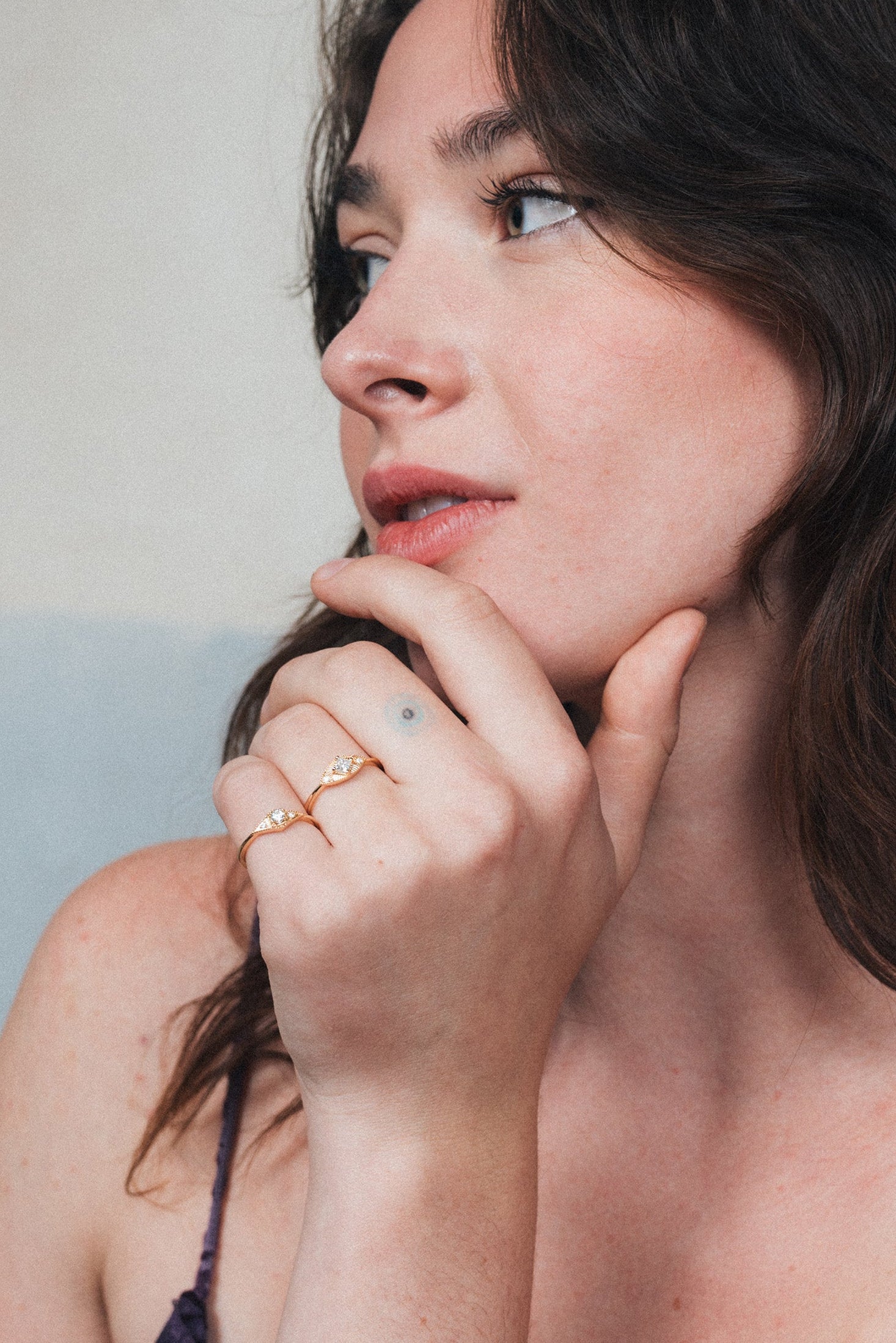 LIRAE vintage-inspired gold ring featuring a square-cut moissanite and sunburst radiant texture, geometric Art Deco jewelry for women.