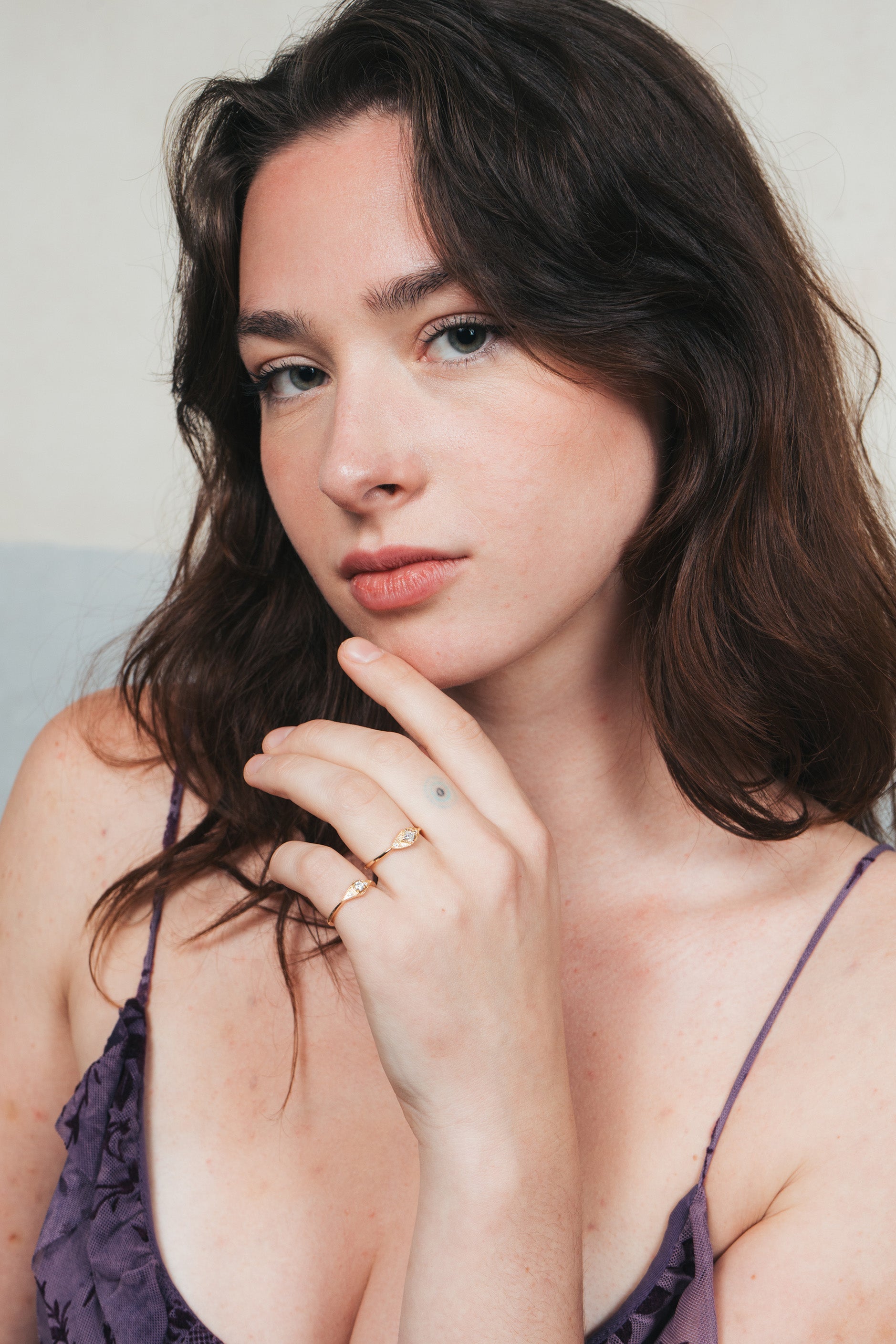 LIRAE vintage-inspired gold ring featuring a square-cut moissanite and sunburst radiant texture, geometric Art Deco jewelry for women.