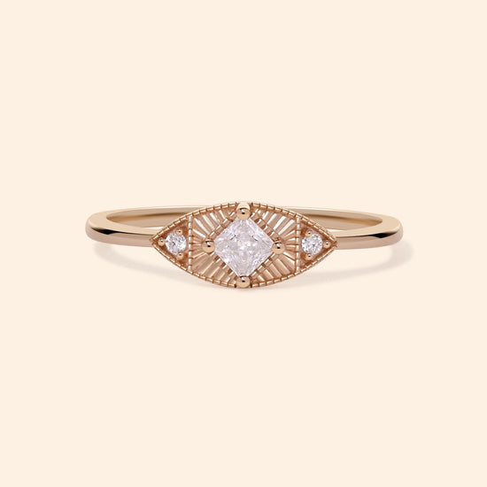 LIRAE vintage-inspired gold ring featuring a square-cut moissanite and sunburst radiant texture, geometric Art Deco jewelry for women.