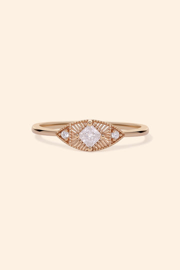 LIRAE vintage-inspired gold ring featuring a square-cut moissanite and sunburst radiant texture, geometric Art Deco jewelry for women.