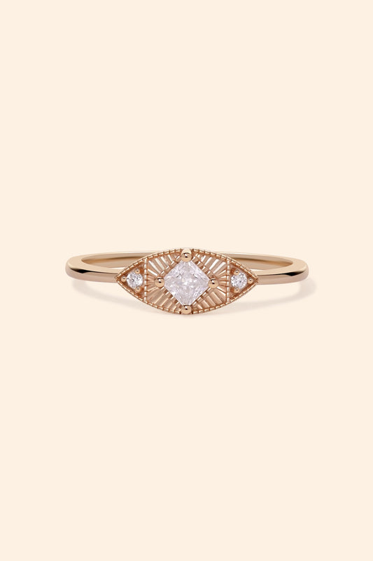LIRAE vintage-inspired gold ring featuring a square-cut moissanite and sunburst radiant texture, geometric Art Deco jewelry for women.