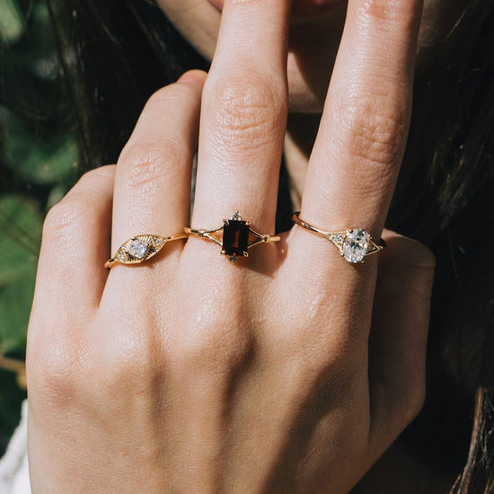 LIRAE vintage-inspired gold ring featuring a square-cut moissanite and sunburst radiant texture, geometric Art Deco jewelry for women.