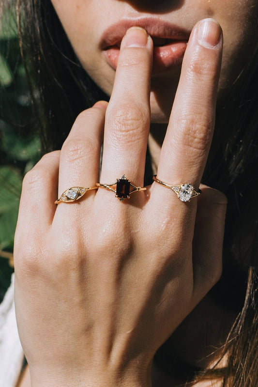 LIRAE vintage-inspired gold ring featuring a square-cut moissanite and sunburst radiant texture, geometric Art Deco jewelry for women.