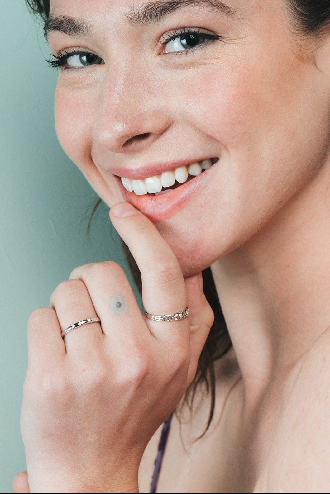 Silver ring with starburst engravings, celestial jewelry by LIRAE.