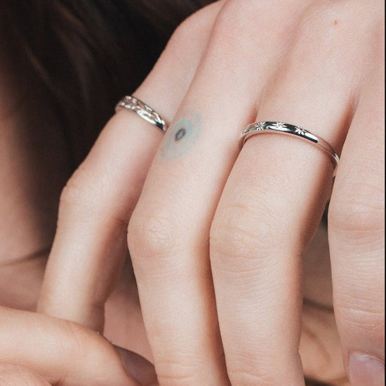 Silver ring with starburst engravings, celestial jewelry by LIRAE.