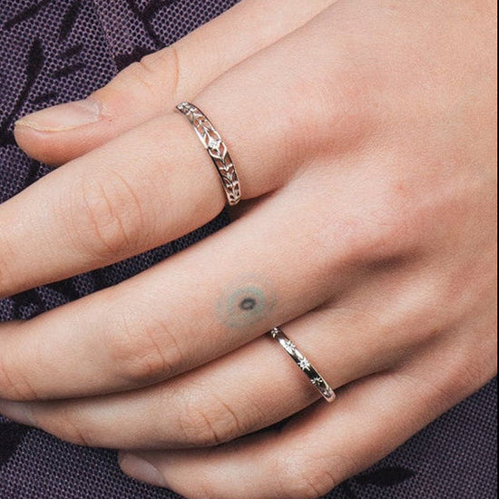 Silver ring with starburst engravings, celestial jewelry by LIRAE.