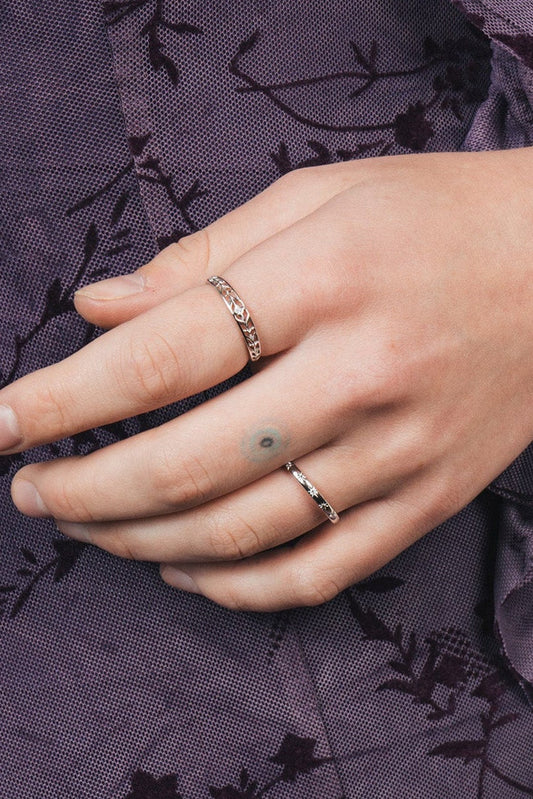 Silver ring with starburst engravings, celestial jewelry by LIRAE.