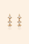 Dainty gold starlight huggie hoop earrings with sparkling moissanite by LIRAE