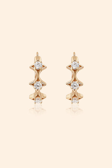 Dainty gold starlight huggie hoop earrings with sparkling moissanite by LIRAE