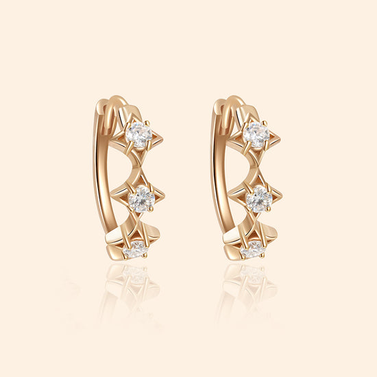 Dainty gold starlight huggie hoop earrings with sparkling moissanite by LIRAE