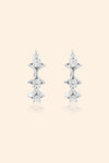 Dainty silver starlight huggie hoop earrings with sparkling moissanites by LIRAE