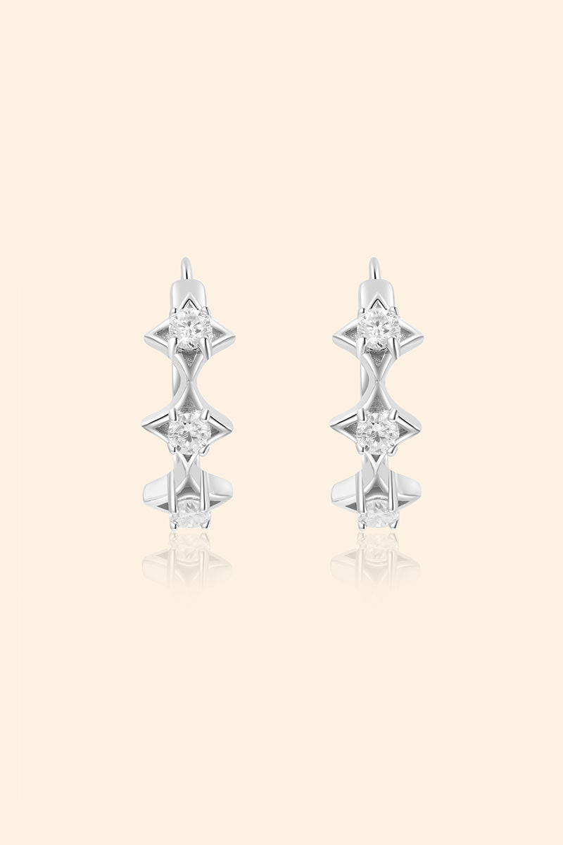 Dainty silver starlight huggie hoop earrings with sparkling moissanites by LIRAE