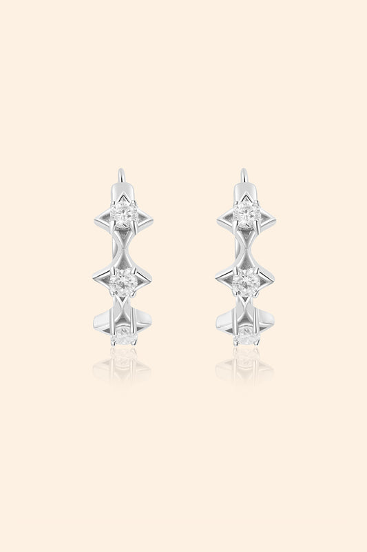 Dainty silver starlight huggie hoop earrings with sparkling moissanites by LIRAE