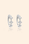 Dainty silver starlight huggie hoop earrings with sparkling moissanites by LIRAE