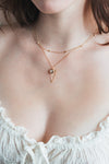Dainty gold star necklace with scattered star charms