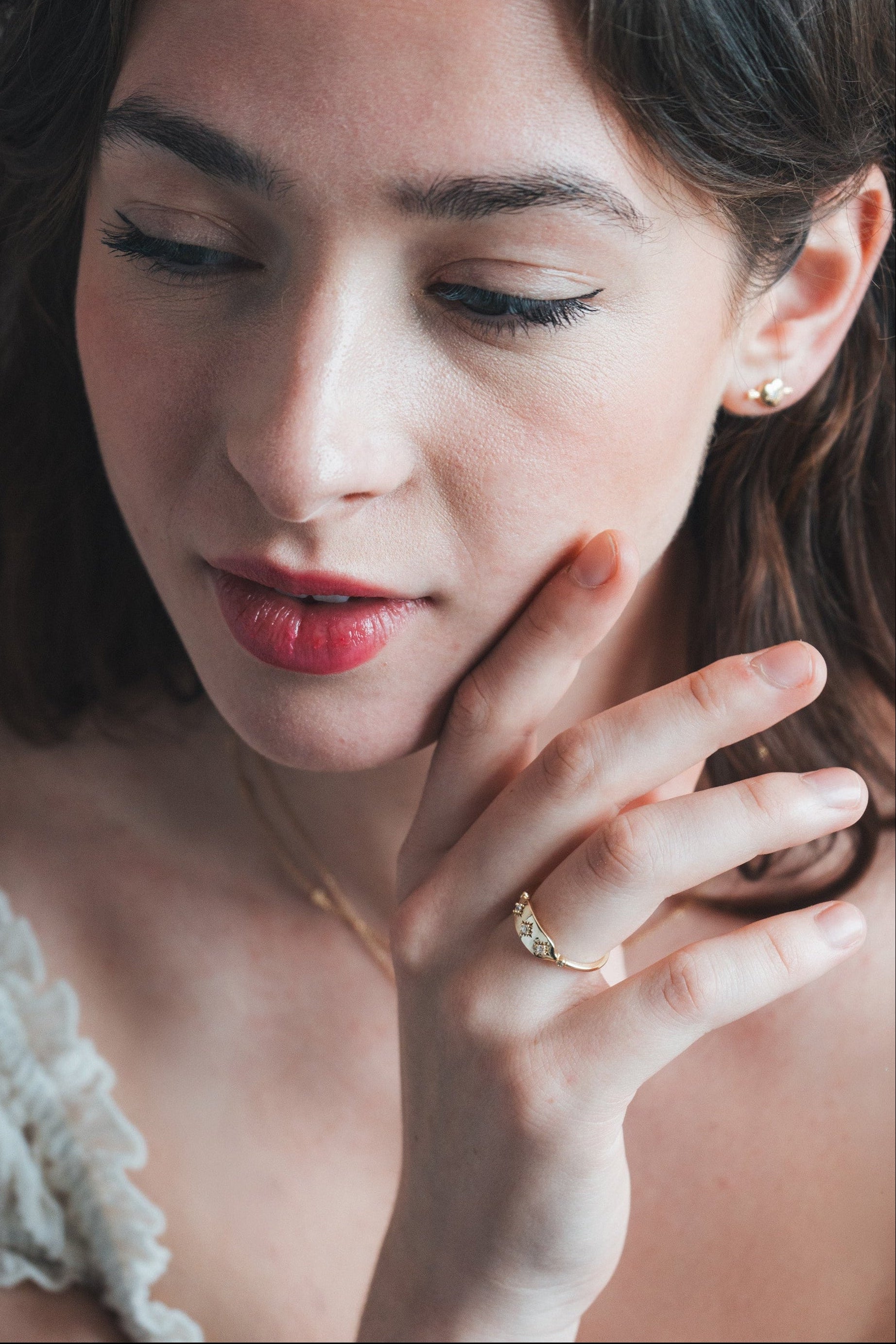 Vintage-inspired 14k gold plated triple star signet ring with diamond accents, handcrafted celestial talisman ring by LIRAE.