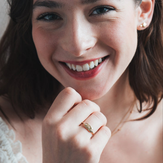 Vintage-inspired 14k gold plated triple star signet ring with diamond accents, handcrafted celestial talisman ring by LIRAE.