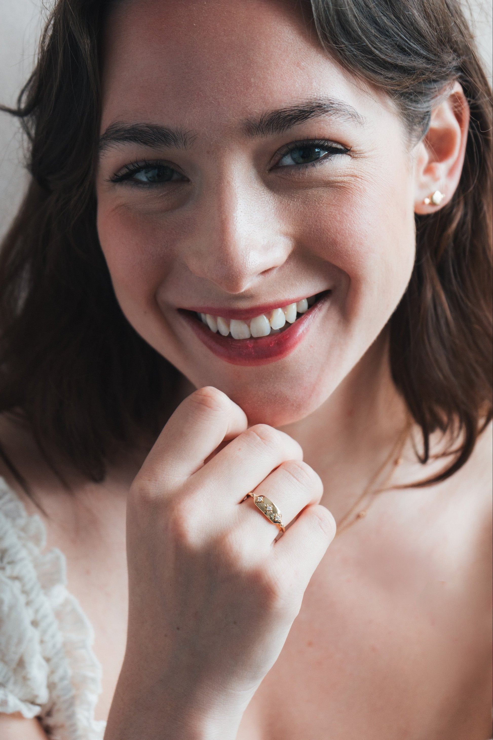 Vintage-inspired 14k gold plated triple star signet ring with diamond accents, handcrafted celestial talisman ring by LIRAE.