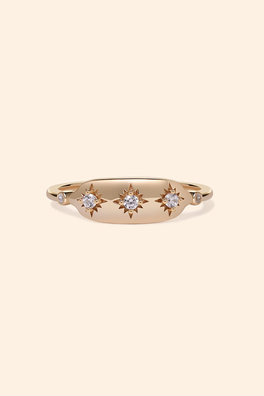 Vintage-inspired 14k gold plated triple star signet ring with diamond accents, handcrafted celestial talisman ring by LIRAE.