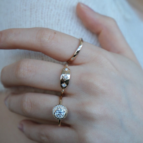 Vintage-inspired 14k gold plated triple star signet ring with diamond accents, handcrafted celestial talisman ring by LIRAE.