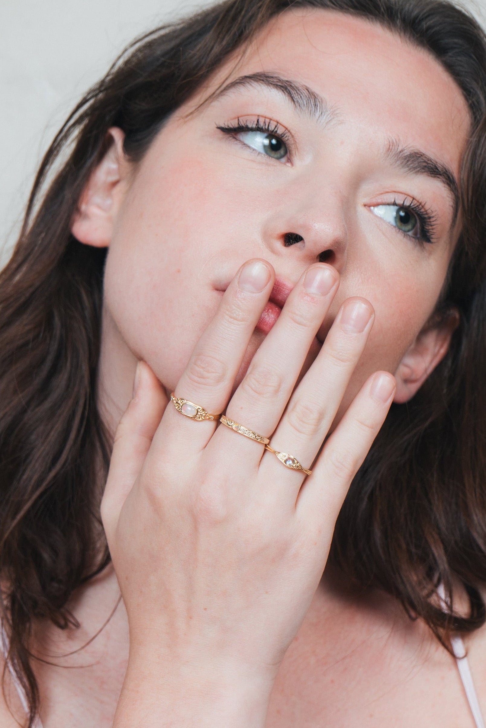 Intricately engraved 14k gold plated filigree band with a center iridescent opal, vintage-inspired scrollwork wedding or stacking ring by LIRAE.
