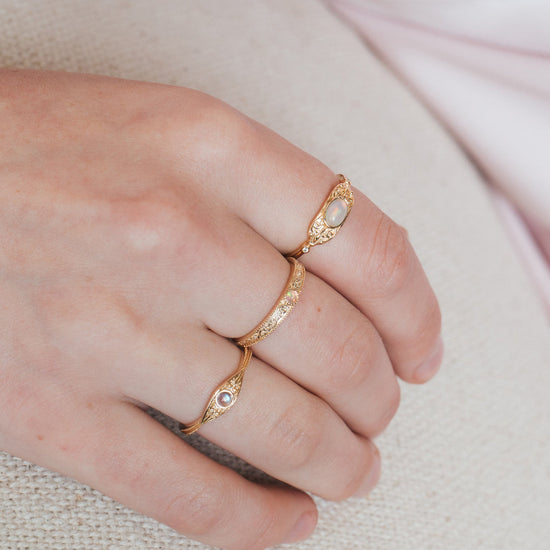 Intricately engraved 14k gold plated filigree band with a center iridescent opal, vintage-inspired scrollwork wedding or stacking ring by LIRAE.