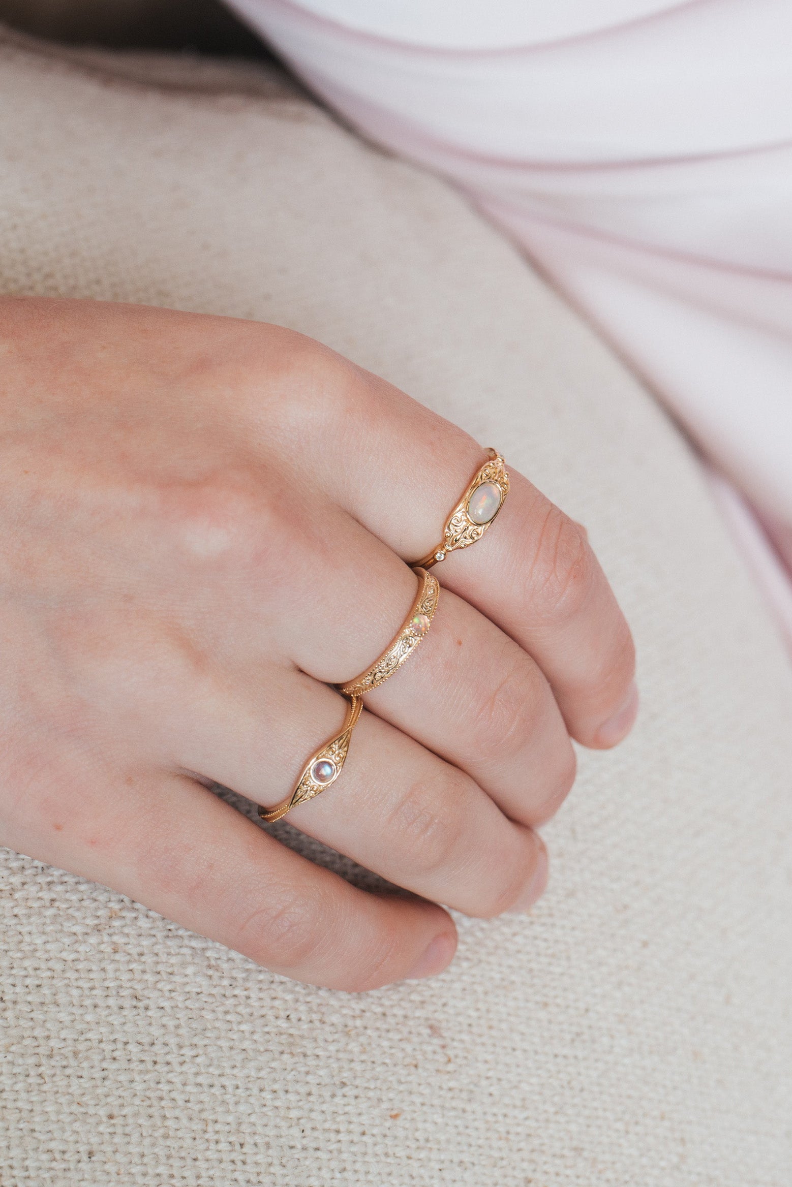 Intricately engraved 14k gold plated filigree band with a center iridescent opal, vintage-inspired scrollwork wedding or stacking ring by LIRAE.